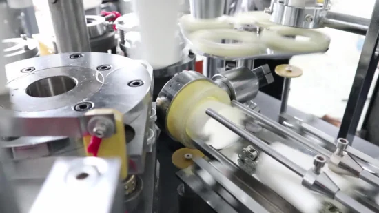 Macchina per la produzione di bicchieri di carta completamente automatica